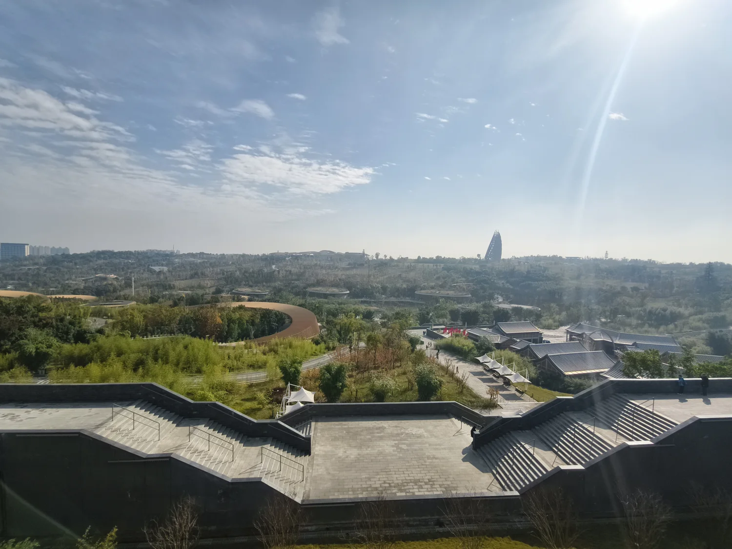 Broad staircases and terraces overlooking the landscaped Panda Base