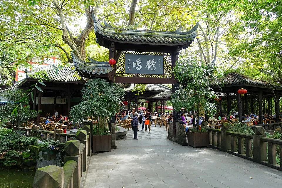 A leafy teahouse entrance in People's Park, Chengdu. Seating, prices and crowd levels may have changed since this photograph.