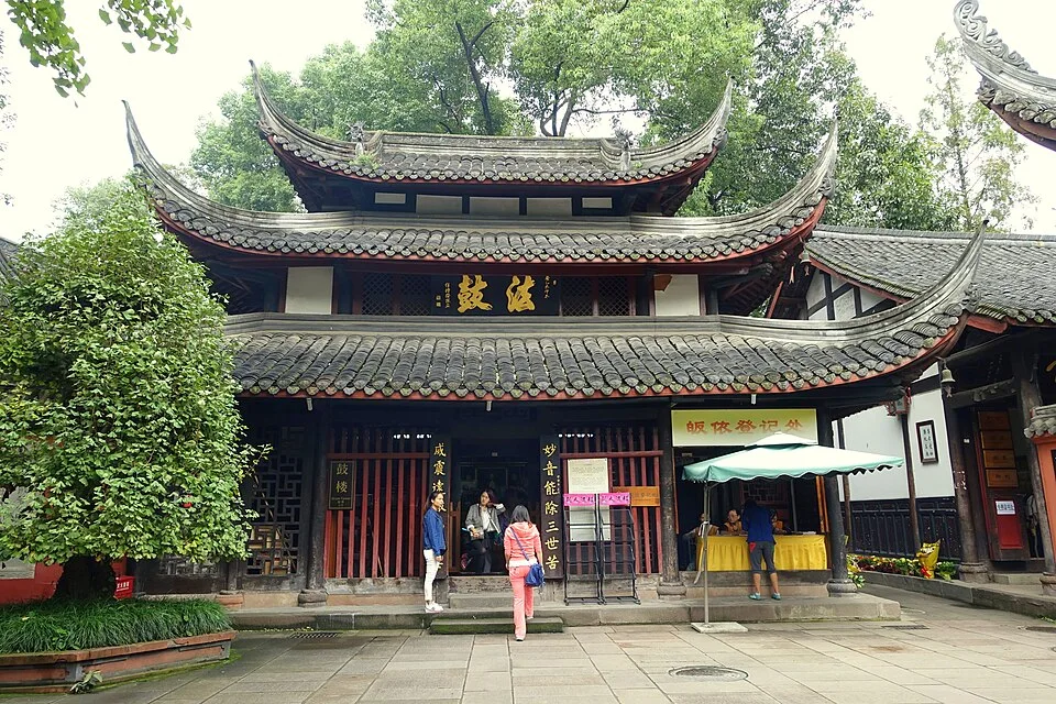 A courtyard building at Wenshu Monastery. The source calls it a hall; visible signage appears to indicate a drum tower, so no precise hall function is claimed.