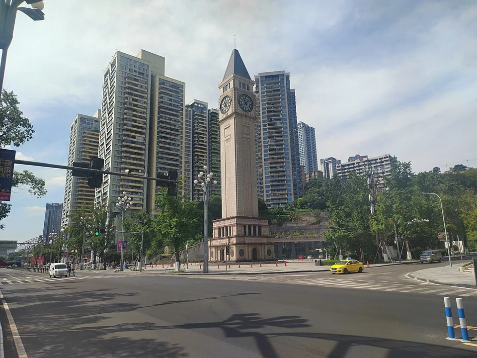 Nanbin Road's clock tower and surrounding streetscape. The river is not visible in this frame; no hotel view is implied.